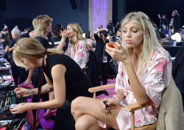 Victoria's Secret, which has a store in Tinity Leeds, is keeping its deals under wraps until Black Friday. Meanwhile, model Devon Windsor prepares backstage before this week's show in Shanghai. For bold eyeliner that stayts put, try Urban Decay's 24/7 Glide-On Pencil, which costs Â£15.50 (Debenhams has 10 per cent off beauty, including 16 per cent off at Urban Decay selected lines). Picture: Aurore Marechal/PA Wire
