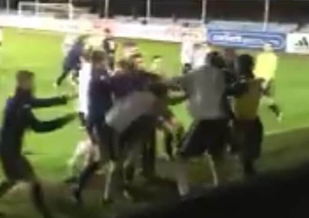 Violence breaks out between Leeds and Rhyl players during last night's 'friendly' in Wales.
