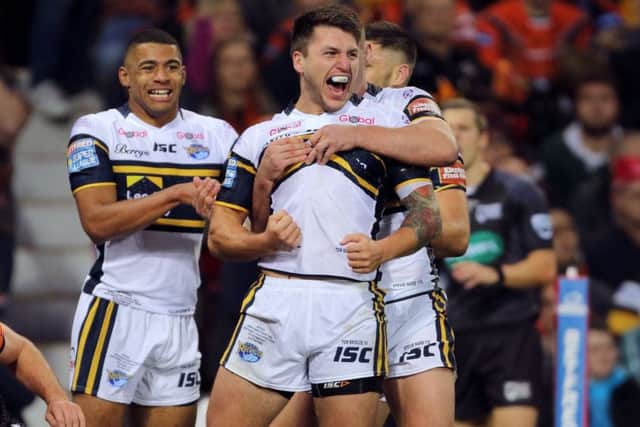 Leeds Rhinos' Tom Briscoe celebrates scoring a try against Castleford Tigers in this year's Grand Final at Old Trafford. Picture: Richard Sellers/PA