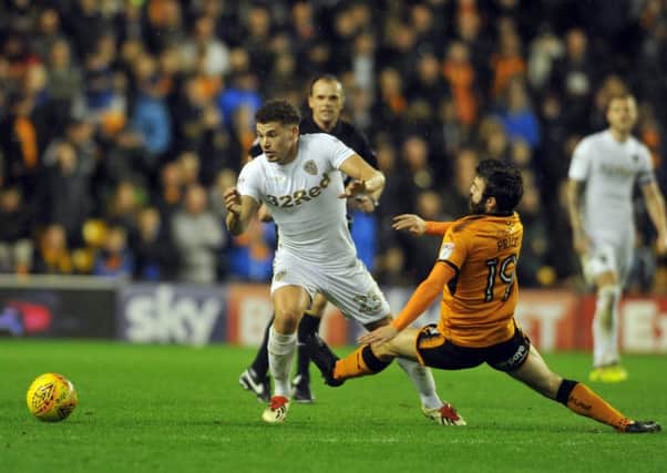 Leeds' Kalvin Phillips tries to get past Wolves' Jack Price. Picture: Tony Johnson.