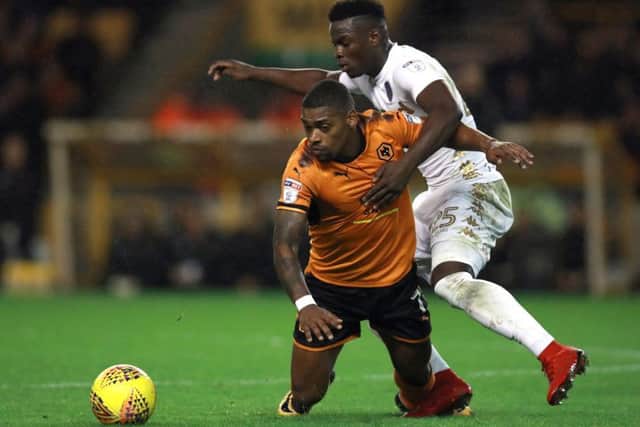 SORRY: Leeds United midfielder Ronaldo Vieira, right, pictured challenging Wolverhampton Wanderers' Ivan Cavaleiro before his red card. Picture: PA.