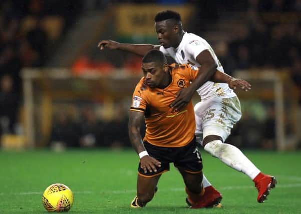 SORRY: Leeds United midfielder Ronaldo Vieira, right, pictured challenging Wolverhampton Wanderers' Ivan Cavaleiro before his red card. Picture: PA.