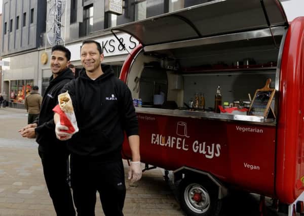 The Falafel Guys Ahmed Gouda (left) with his brother Abdalla.