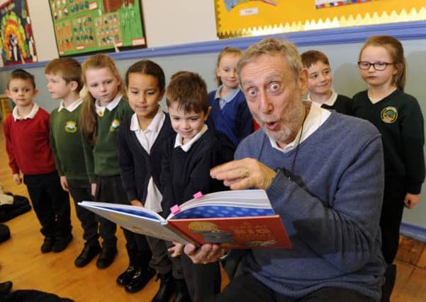 Former Childrens laureate Michael Rosen pictured with children at Crossgates Primary School, Leeds..27th November 2017 ..Picture by Simon Hulme