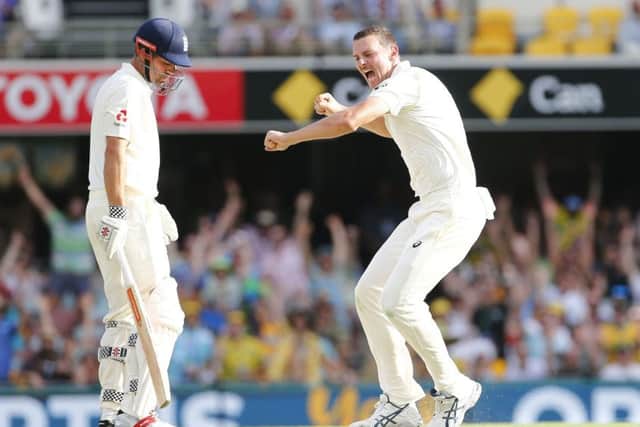 Australia's Josh Hazelwood celebrates the wicket of England's Alastair Cook. Picture: Jason O'Brien/PA