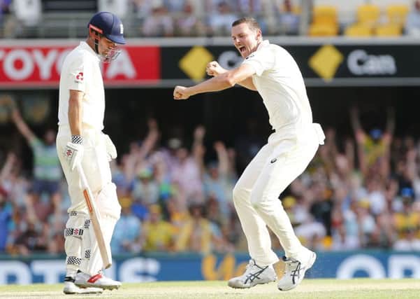 Australia's Josh Hazelwood celebrates the wicket of England's Alastair Cook. Picture: Jason O'Brien/PA