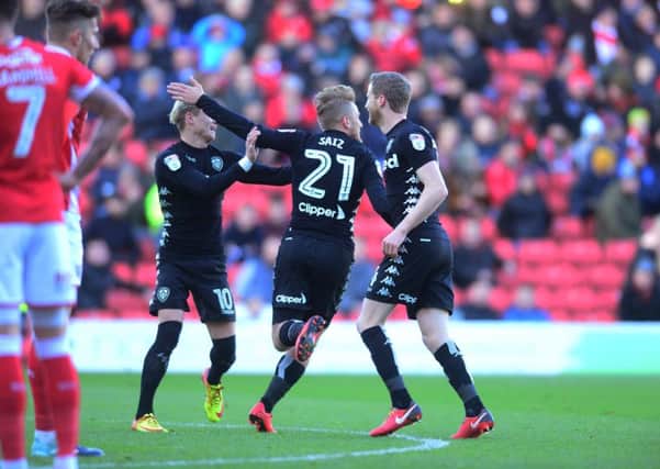 Samuel Sai wheels away to celebrate his opener at Oakwell. Picture: James Hardisty.