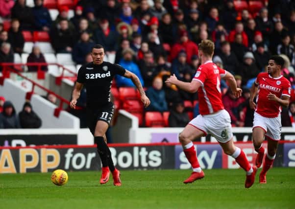 Leeds United's Jay-Roy Grot, is closed down by Barnsley's Liam Lindsay. Picture: James Hardisty.