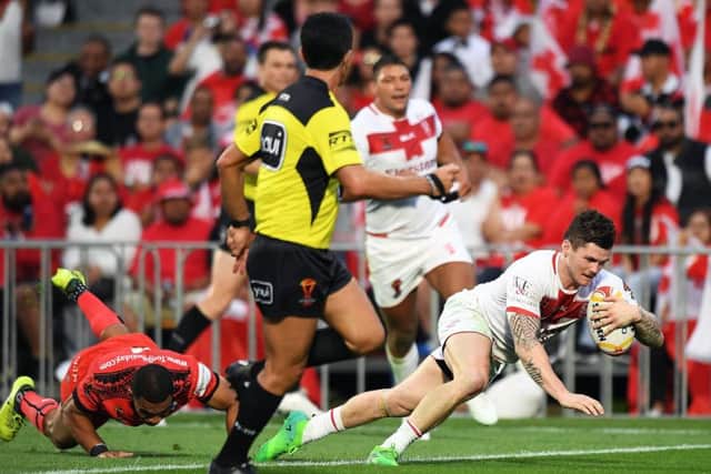 John Bateman scores what proved to be England's winning try against Tonga.