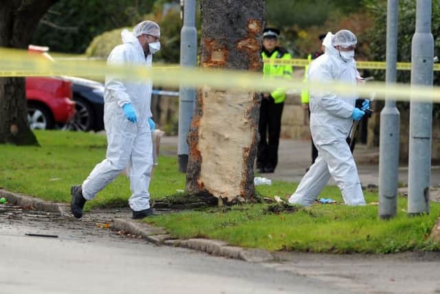 Forensic police officers at the scene of the fatal accident on Stonegate Road. Picture Tony Johnson.