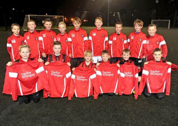Rothwell Juniors and their new kit