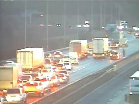 A lorry and car were involved in a crash on the M62 this morning