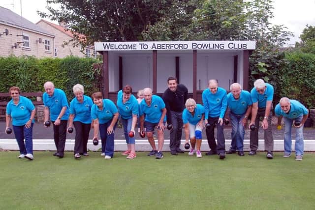 Aberford Bowling Club members with Lewis Stokes from the Banks Group.