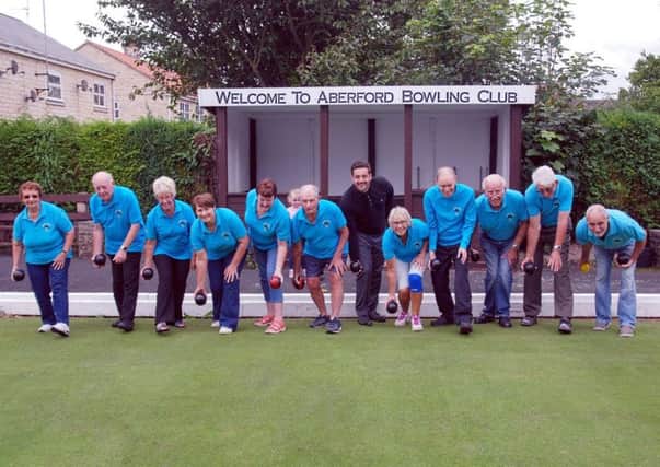 Aberford Bowling Club members with Lewis Stokes from the Banks Group.