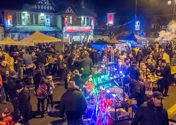 FESTIOVE LIGHTS: Crowds flock to Burley-in-Wharfedale. PIC: Ian Lamond Photography