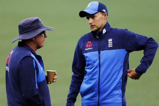 PREPARATIONS: England captain Joe Root talks with coach Trevor Bayliss during a nets session at the Adelaide Oval on Friday. Picture: Jason O'Brien/PA