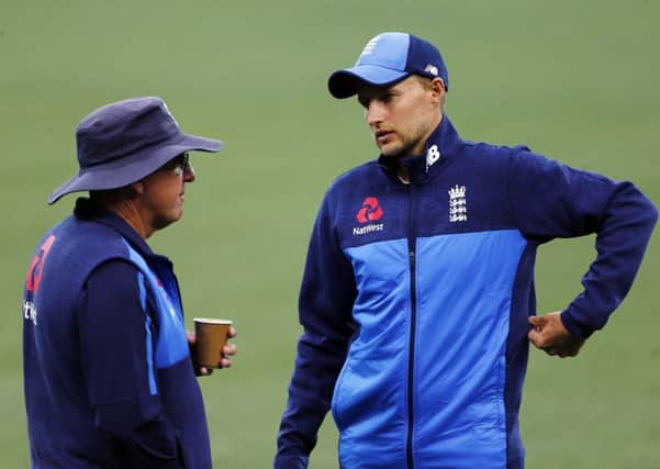 PREPARATIONS: England captain Joe Root talks with coach Trevor Bayliss during  a nets session at the Adelaide Oval on Friday. Picture: Jason O'Brien/PA