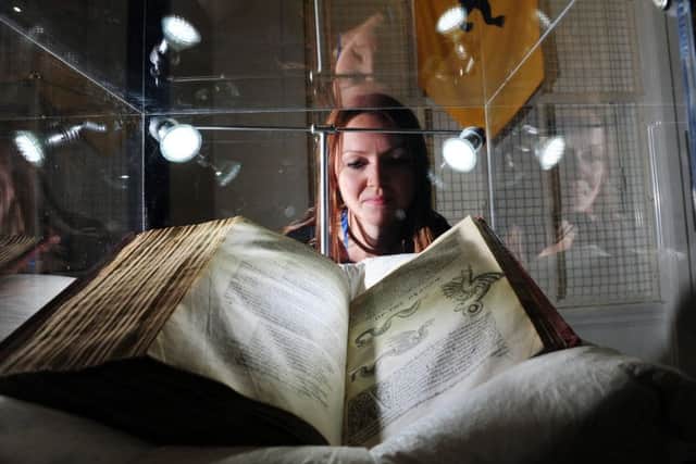 History of Magic Exhibition at Leeds Central Library..Rhian Isaac looks at the Historie of Four- Footed Beastes by Edward Topsell dated 1607..1st December 2017 ..Picture by Simon Hulme