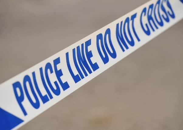 Police are searching for a suspect in Stanningley after a 21 year-old was injured
