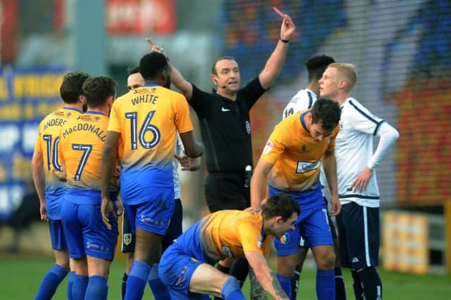 Referee Carl Boyeson sends off Guiseley's Darren Holden. PIC: Jonathan Gawthorpe