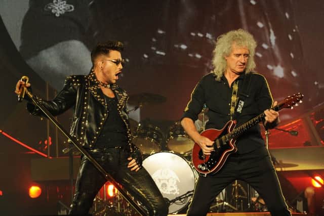 Adam Lambert with Brian May of Queen.