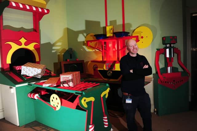Kevin Blenkinsop pictured with the Santas workshop built out of scrap, at Temple Newsam House, Leeds..4th December 2017 ..Picture by Simon Hulme