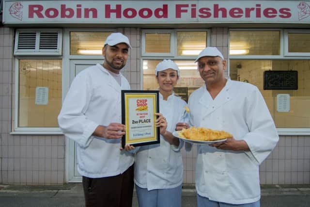 SECOND PLACE: Gurdeep Bains, with parents  Gurminder Bains, and Kulwant Singh Bains outside Robin Hood Fisheries.