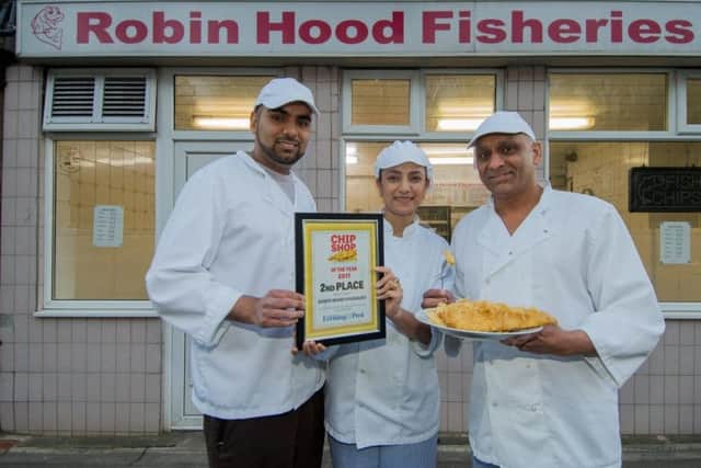 Yorkshire Evening Post Chippy of The year. Pictured 2nd Place, Robin Hood Fisheries, Leeds Road, Robin Hood, Wakefield, (left to right) Gurdeep Bains, with parents  Gurminder Bains, and Kulwant Singh Bains. Picture James Hardisty.