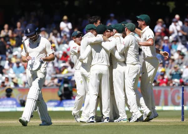 THAT WINNING FEELING: Australian players celebrate the final wicket of Jonny Bairstow to win the second test at the Adelaide Oval. Picture: Jason O'Brien/PA