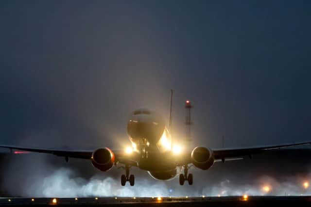 A flight battling the winds to land at Leeds Bradford airport this morning