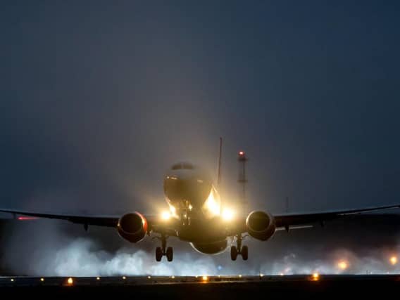 A flight battling the winds to land at Leeds Bradford airport this morning