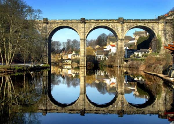 Picture Post.
Taken on the Nikon D2H camera, 320 iso, F11 at 500th of a second on the 17-28 mm lens.
Knaresborough viaduct is reflected in the still waters of the River Nidd on Tuesday 2nd March 2004.