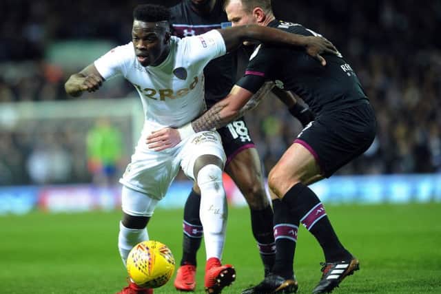 Ronaldo Vieira takes on Aston Villa's Glenn Whelan.