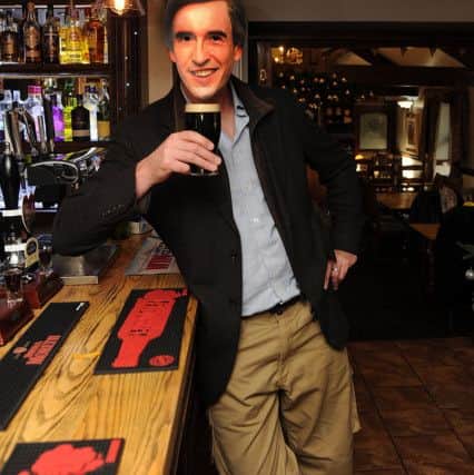 Alan takes a break at the bar.