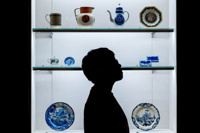 Date: 5th December 2017.
Picture James Hardisty.
MA Art Gallery and Museum Studies students from Leeds University have created an exhibition of Yorkshire pottery within The Stanley and Audrey Burton Galley inside the Parkinson Building at Leeds University. Pictured Hanyi Jin, MA Art Gallery and Museum Studies student, looking at the exhibits on display.