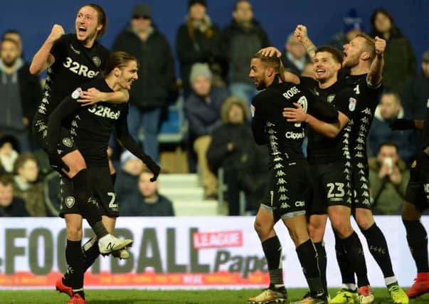 GET IN THERE: Leeds United celebrate Kemar Roofe's second goal. Picture by Bruce Rollinson.
