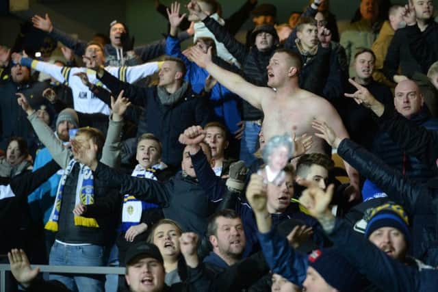 Leeds United fans celebrate at full time.