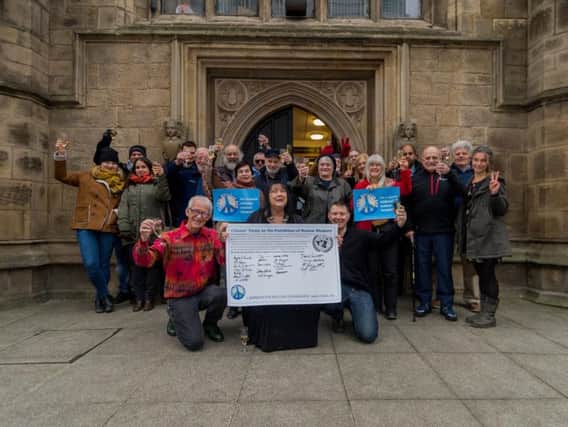 Campaigners outside Mill Hill Chapel today.