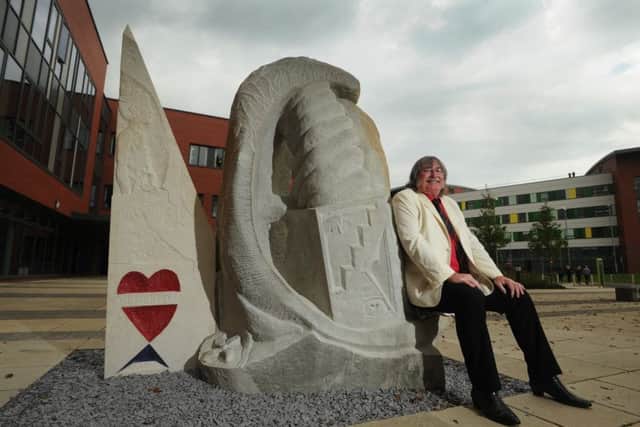 Stephen Hines with his sculpture 'The Tree of Life' outside Pinderfields Hospital.