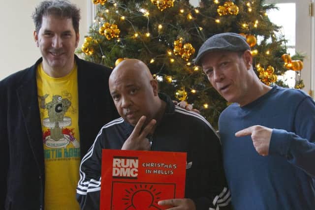 Film maker Mitchell Kezin with Joseph 'Rev Run DMC' Simmons and Bill Adler, former publicist for Def Jam Recordings.