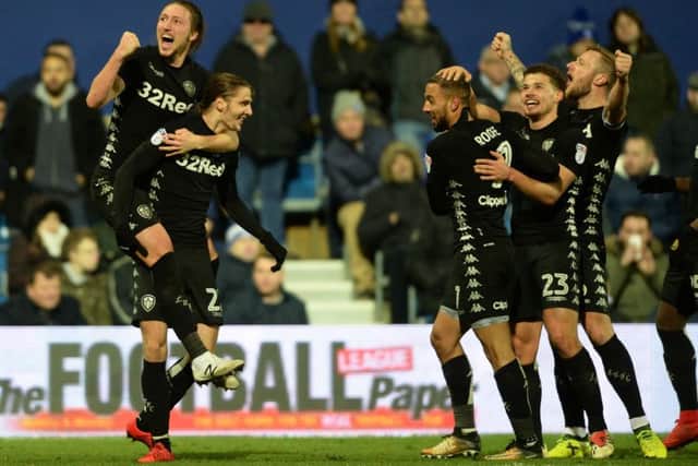 YOU BEAUTY! Leeds United and Kemar Roofe celebrate the striker's second goal at Loftus Road.  Picture: Bruce Rollinson