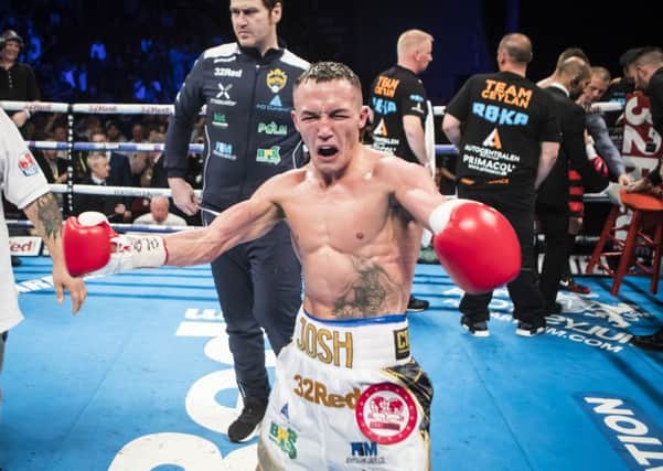 HIT MAN: Josh Warrington celebrates beating Dennis Ceylan at Leeds' First Direct Arena earlier this year. Picture: Danny Lawson/PA Wire.