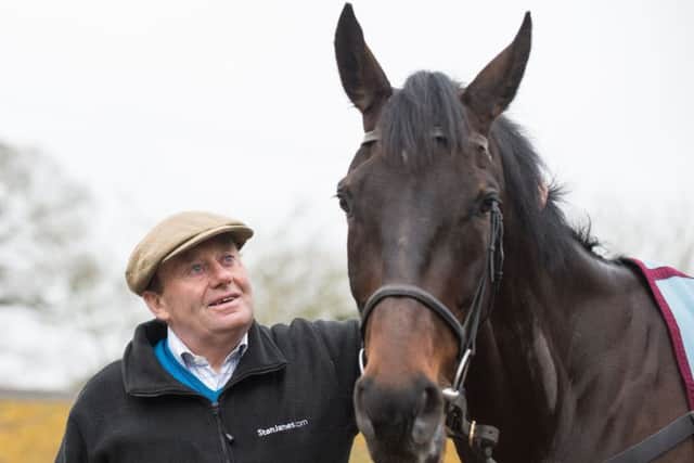 Nicky Henderson and Might Bite