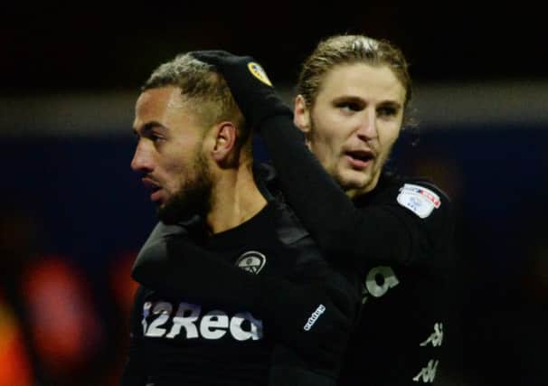 Kemar Roofe celebrates with Pawel Cibicki after scoring his first goal at QPR.