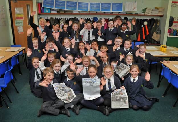 14 December 2017......      Year four pupils and budding  journalists at a St Theresa's Catholic Primary School in Crossgates have been creating their own front page story as part of a Yorkshire Evening Post backed reading scheme. Picture Tony Johnson.