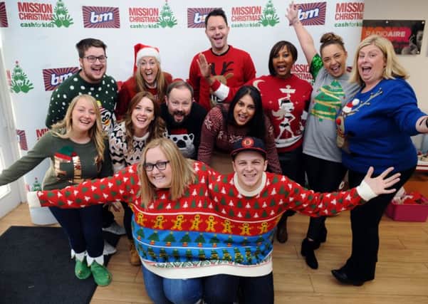 Radio Aire staff in Christmas jumpers on Christmas jumper day. 
8th December 2017.
Picture Jonathan Gawthorpe