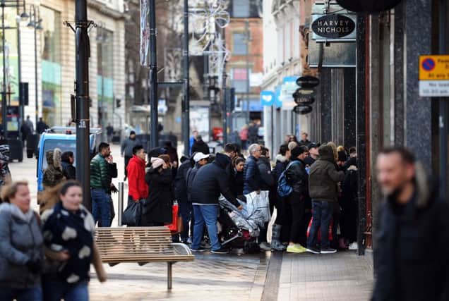 Boxing Day sales shoppers queue outside Harvey Nichols on Briggate in Leeds.
26th December 2017.
Picture Jonathan Gawthorpe