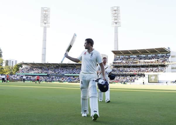 England's Dawid Malan acknowlegdes the crowd as he walks off at stumps on day one at the WACA. Picture: Jason O'Brien/PA