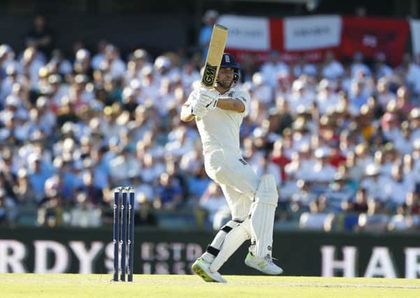 England's Dawid Malan brings up his  his century on day one at the WACA. Picture: Jason O'Brien/PA