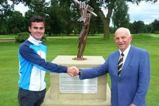 Vardon Grip Trophy winner David Hague with Harrogate GC official John Robinson after his win last year.